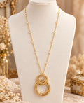Gold-Tone Crystal Station Necklace with Interlocking Ring Pendant